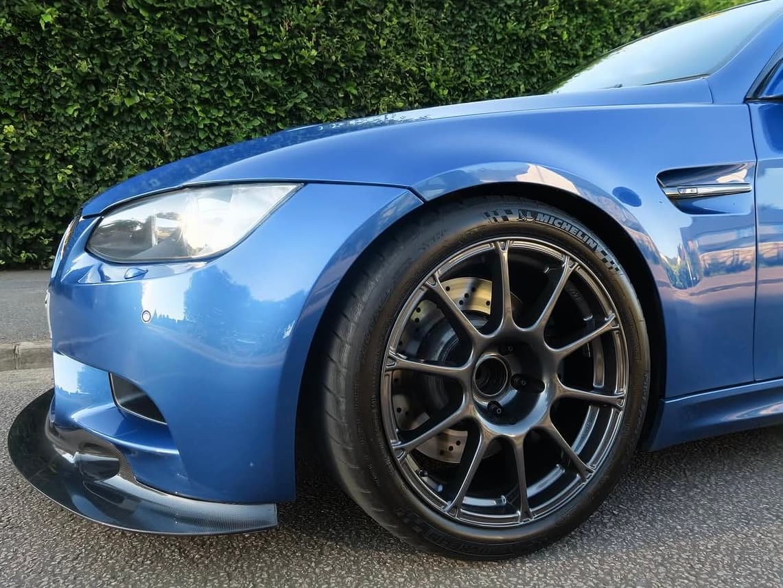 Blue BMW M3 wheel and Michelin tyre